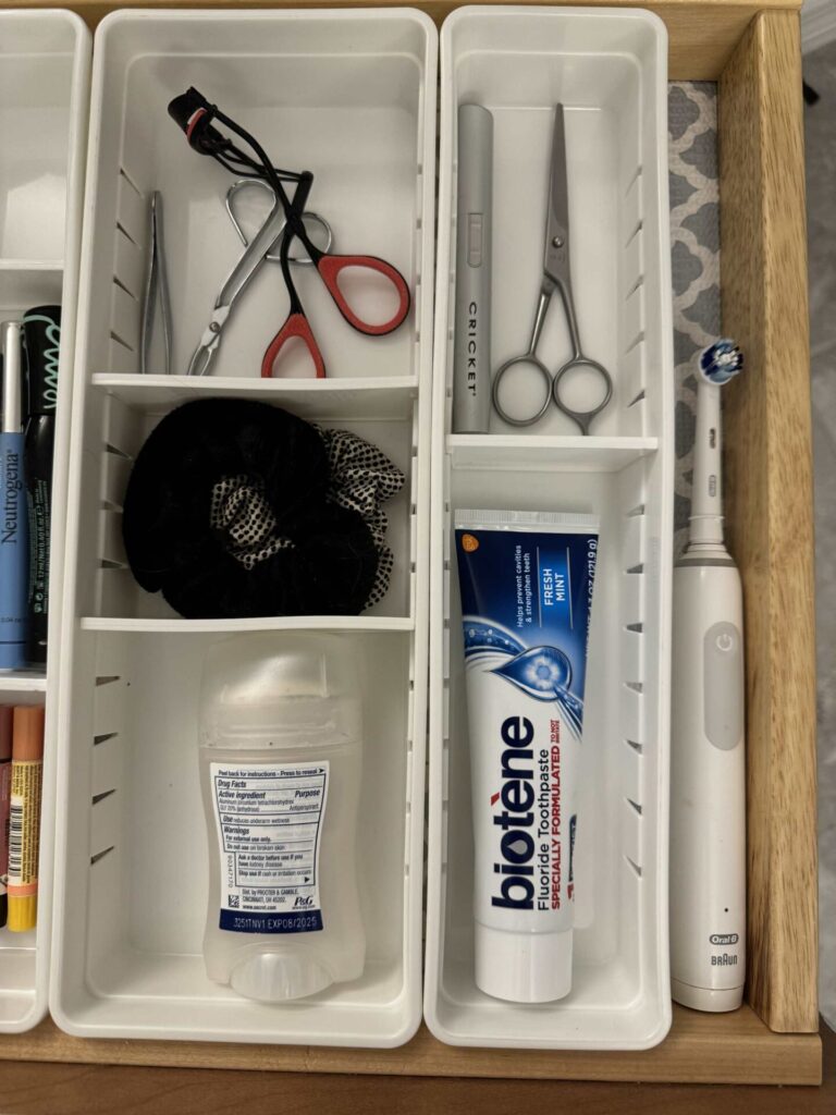 Daily hygiene items arranged in divided trays. 