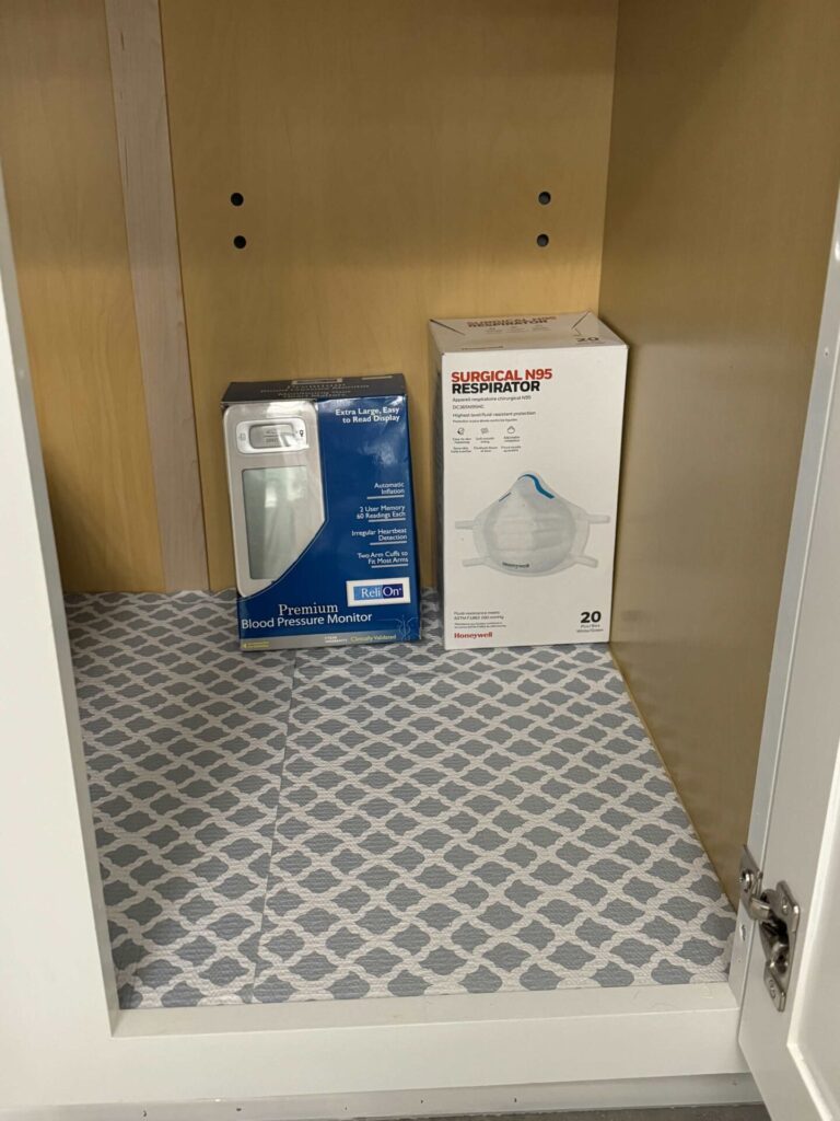 Organized cabinet under bathroom sink. 