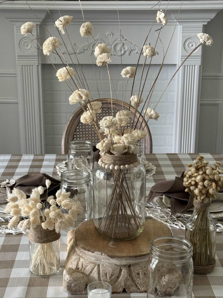 A dining table centerpiece made of wood flowers. 