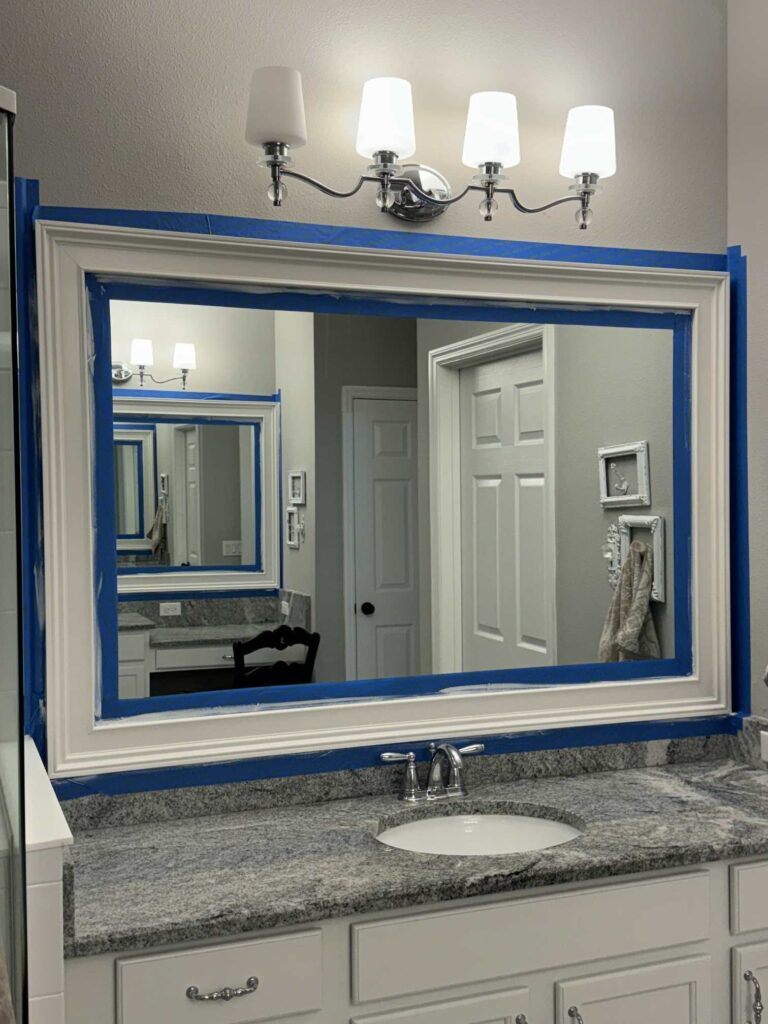 Step seven to upgrade a bathroom mirror is to paint it.  