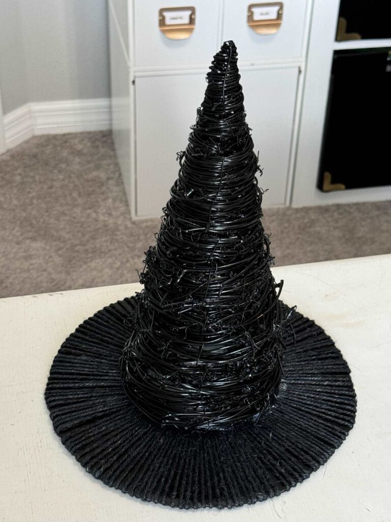 A black DIY witch's hat. 