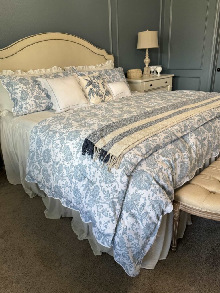 A blue and white bedroom. 