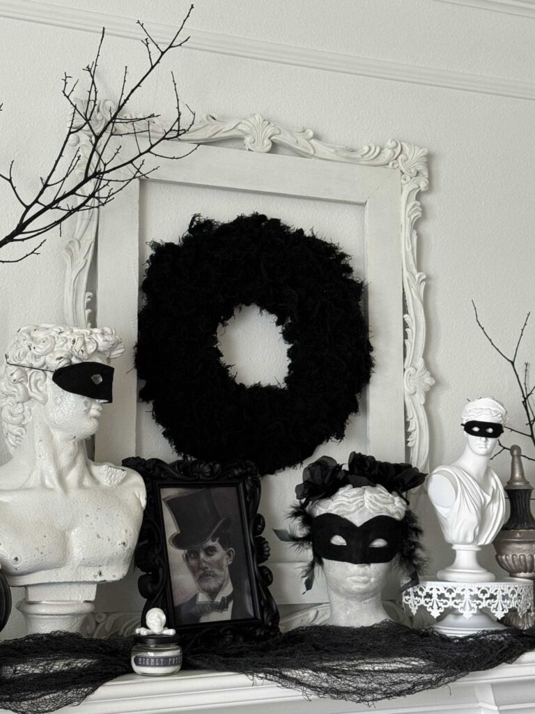 A mantle with Halloween decorations. 