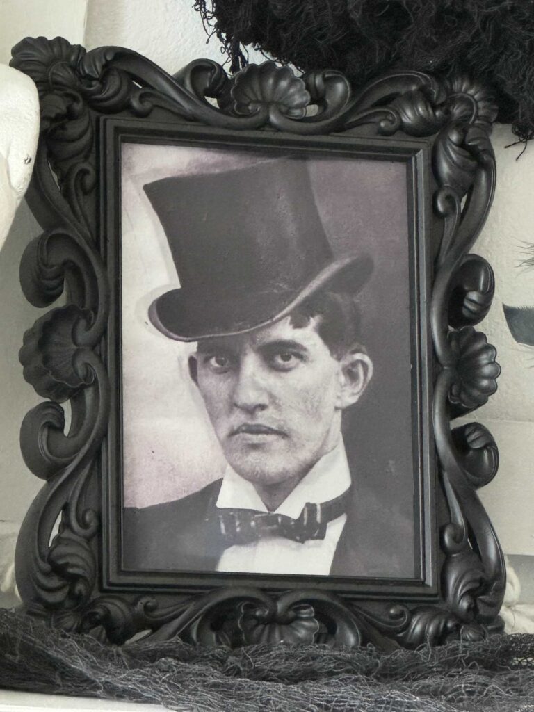 A picture of a man in a top hat. 