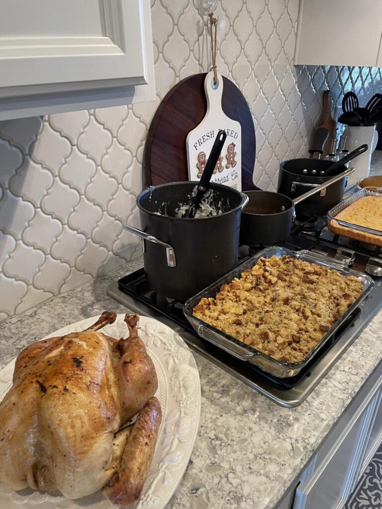 Host Thanksgiving and serve a turkey, dressing, corn pudding, mashed potatoes, green beans, and gravy. 