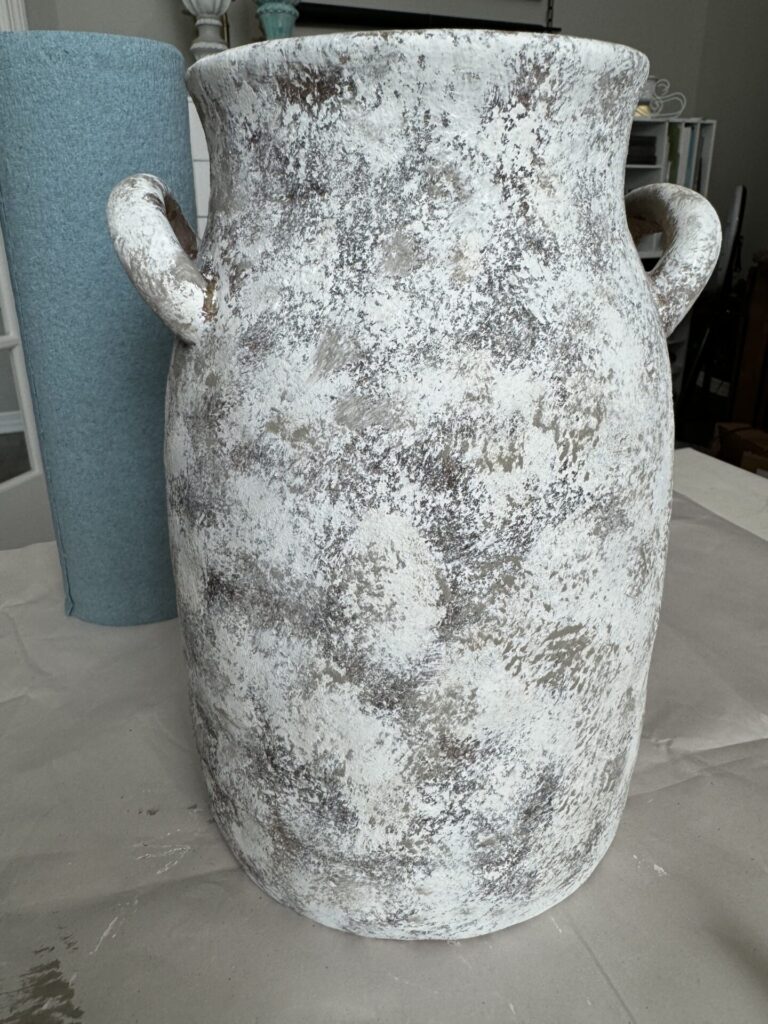 A painted vase. 