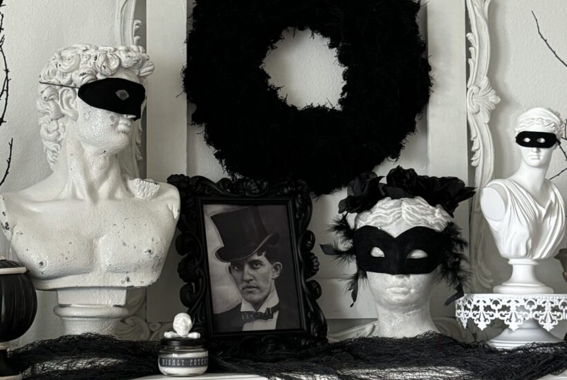 black and white mantel decorated for Halloween