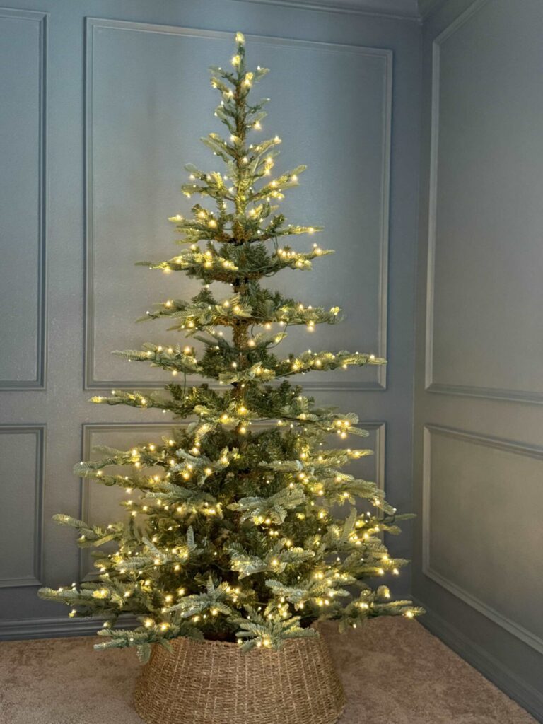 7' King Noble Fir Artificial Christmas Tree with warm lights. 