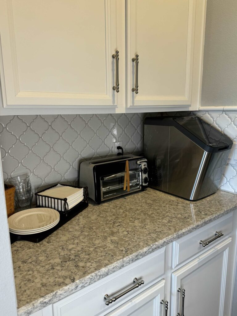 An organized counter in a  butler's pantry. 