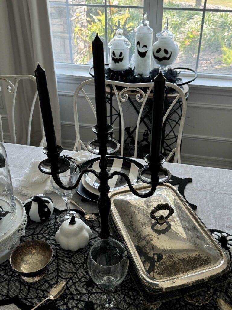 A tarnished silver serving dish on a Halloween tablescape. 