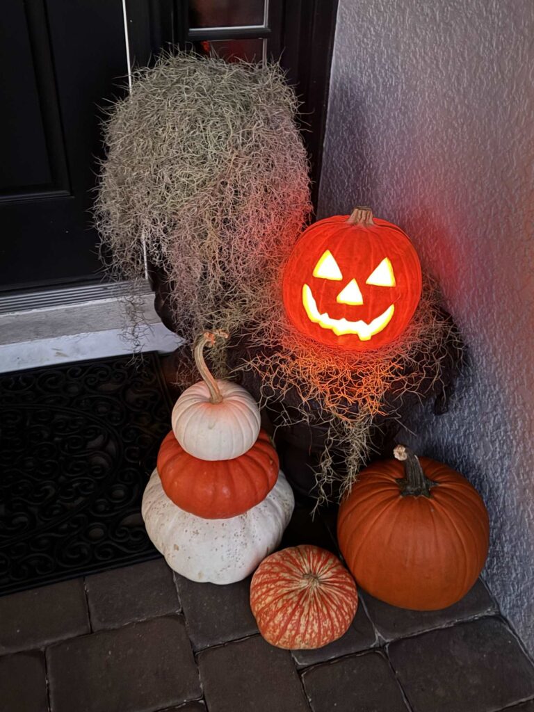 A lit jack-o-lantern. 