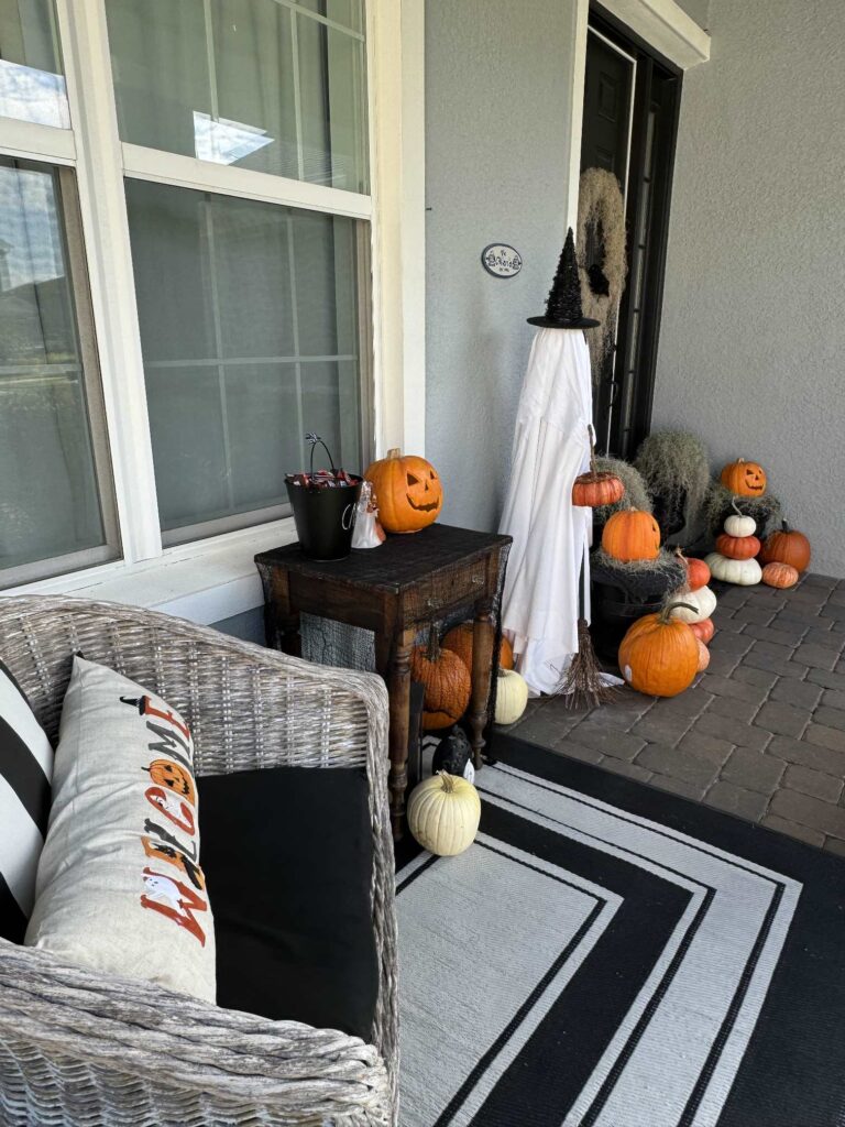 Porch decked out for spooky season. 