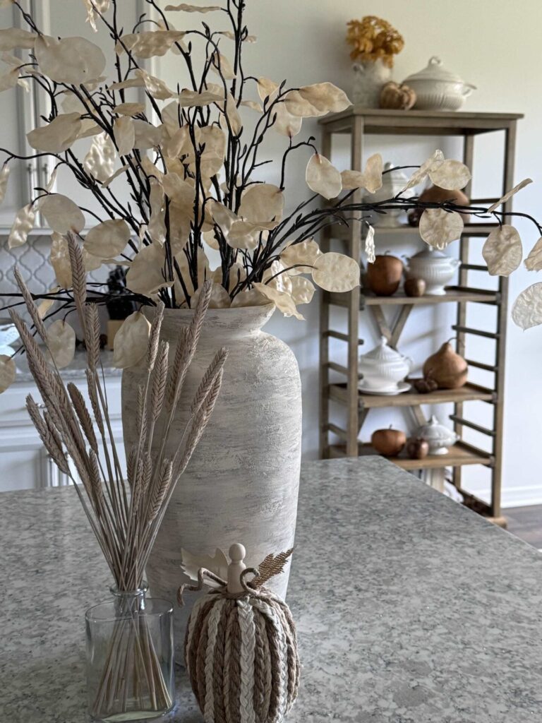 A vase on a kitchen counter. 