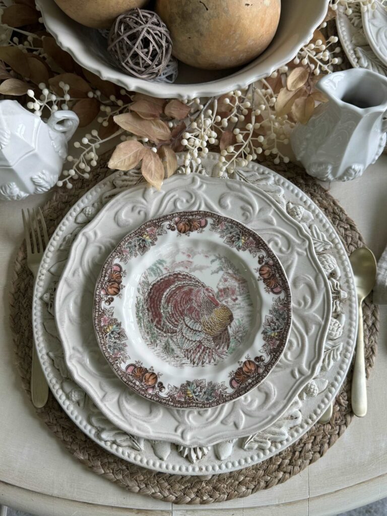 A Thanksgiving table setting using a DIY charger plate. 