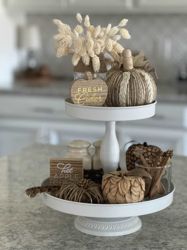 A tiered tray decorated for a fall home tour. 