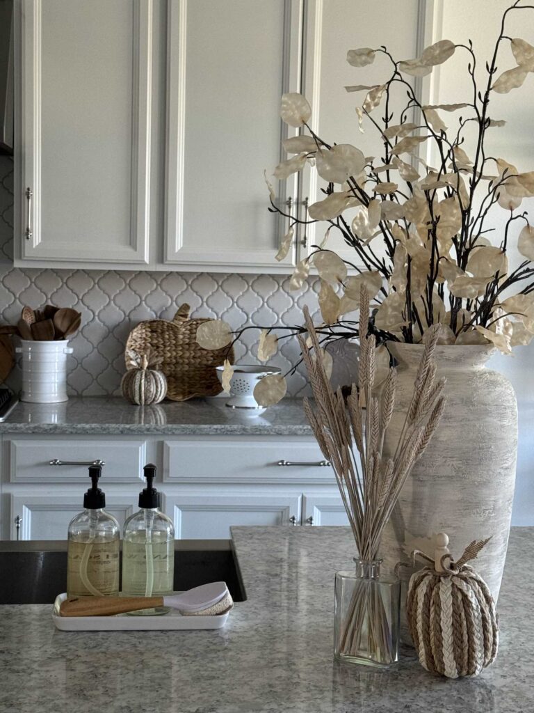 A kitchen decorated for a fall home tour. 