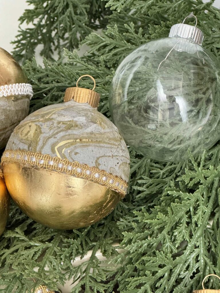 A plain ornament and a DIY gold leaf ornament. 