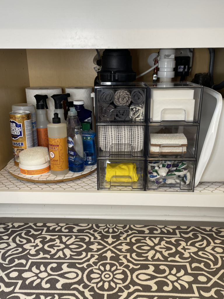 Organized under kitchen sink cabinet. 