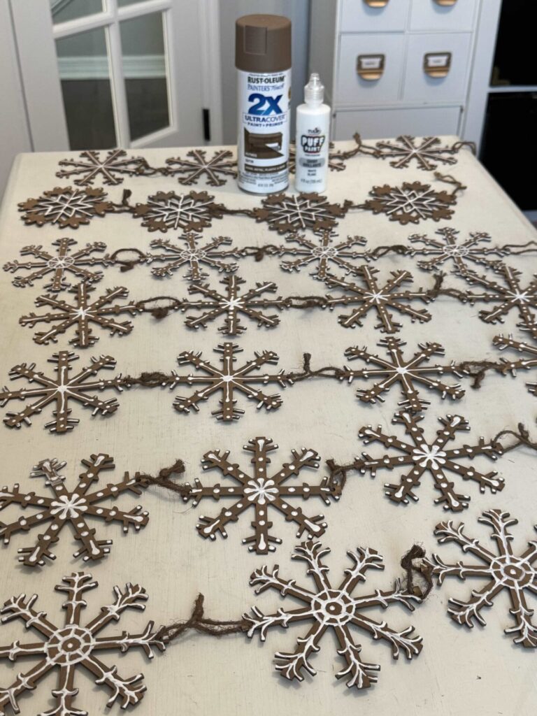 Wood snowflakes painted like gingerbread. 