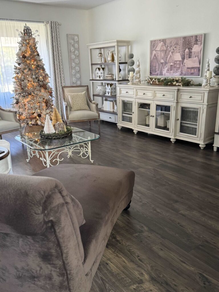 A living room decorated with gingerbread Christmas decor. 