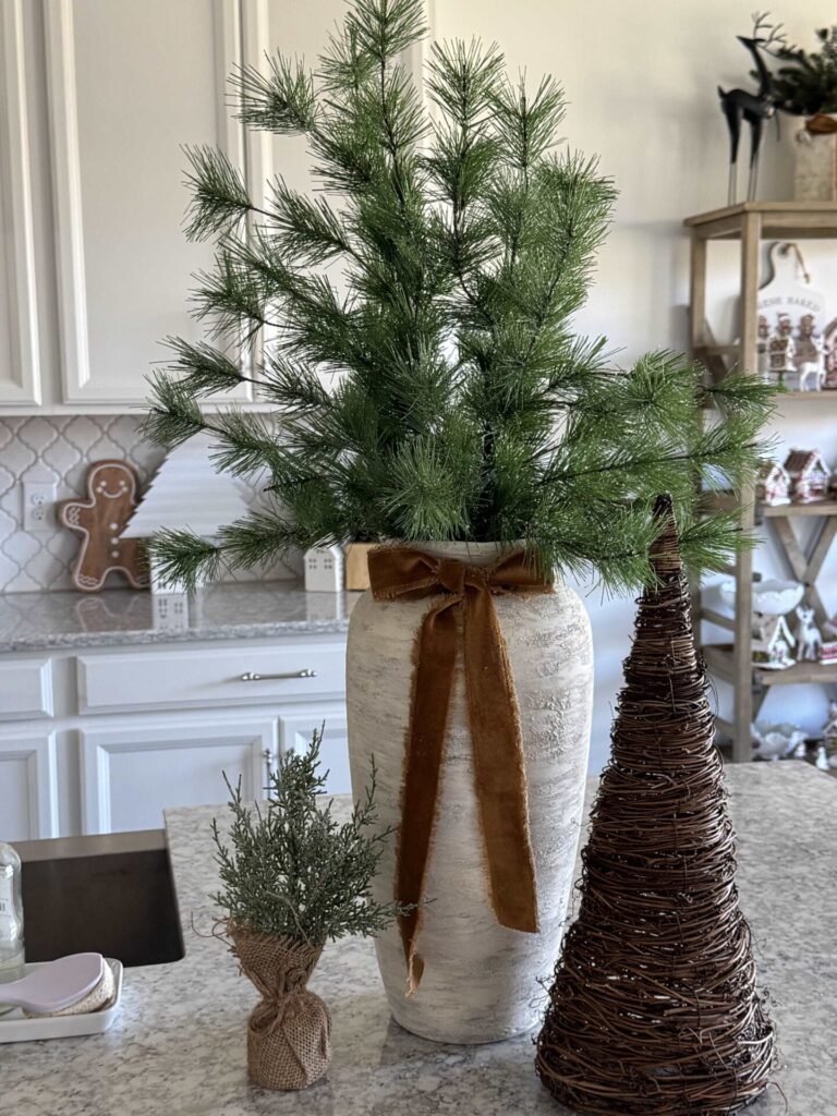 Evergreen arrangement on a kitchen counter. 