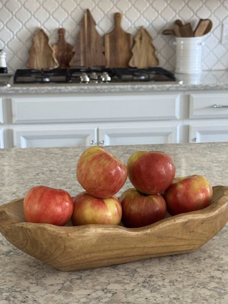 Apples in a wood bowl. 