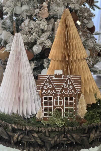 Vignette with gingerbread house and honeycomb trees.