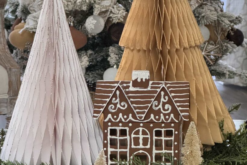 Vignette with gingerbread house and honeycomb trees.