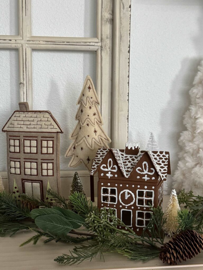 Another gingerbread house with a felt house and tree. 