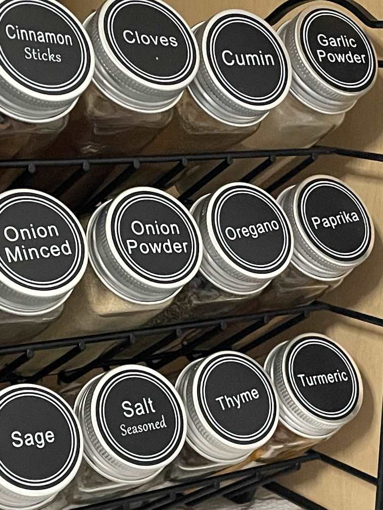 Spices organized on a rack during the Winter Home Organization Challenge. 