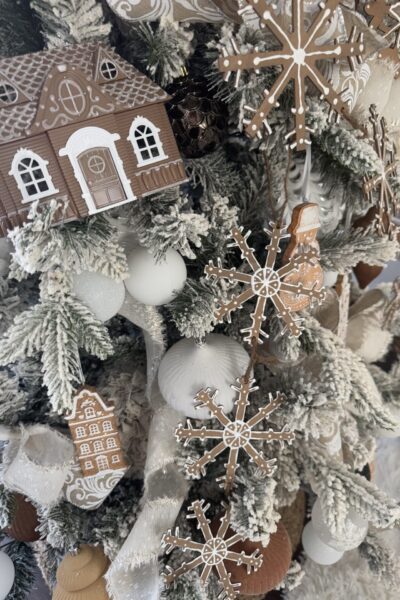 DIY Gingerbread house and garland on a tree.