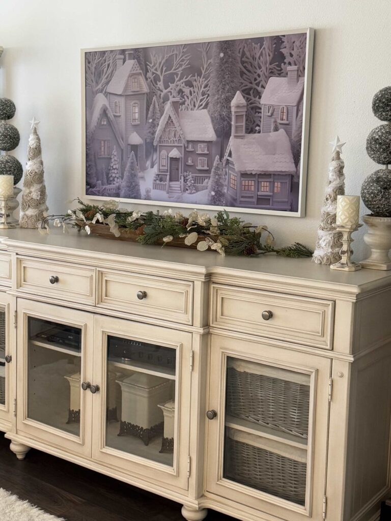 Gingerbread village artwork on a frame TV. 