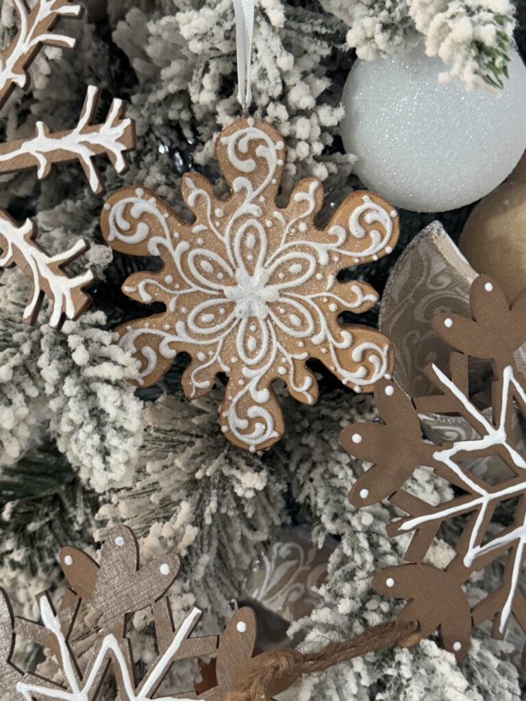 Gingerbread Christmas ornament on a tree. 