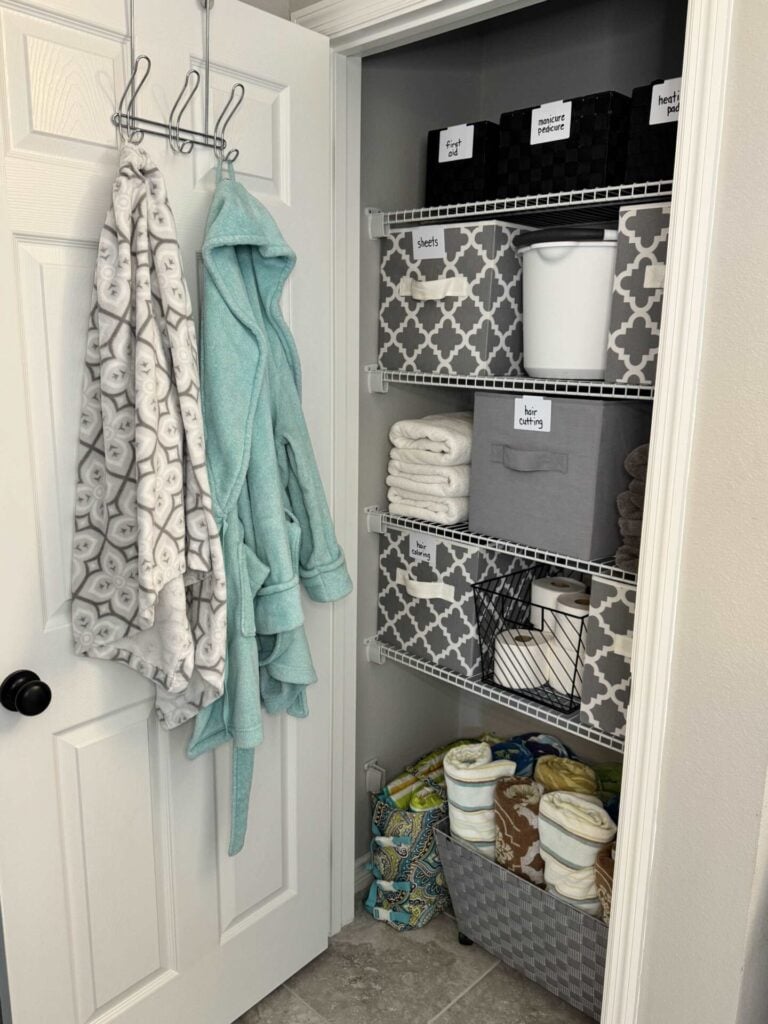 An organized bathroom closet.