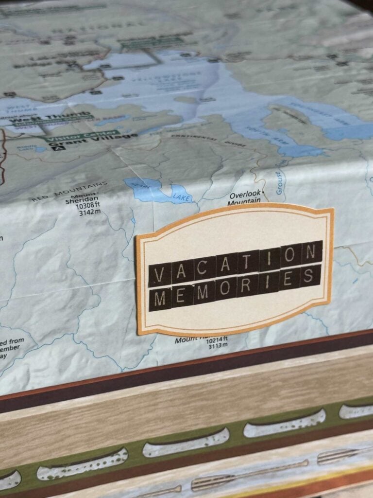 A DIY memory box that says vacation memories.