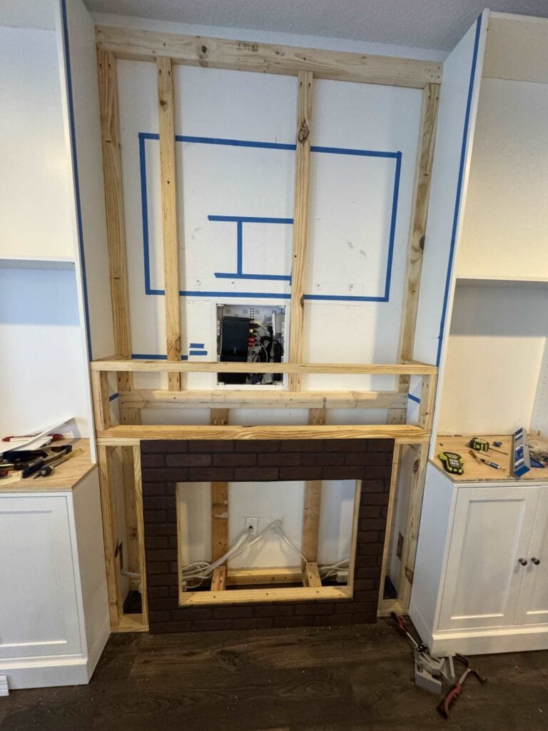 More tv wall framing that shows fireplace insert connected tv wall framing