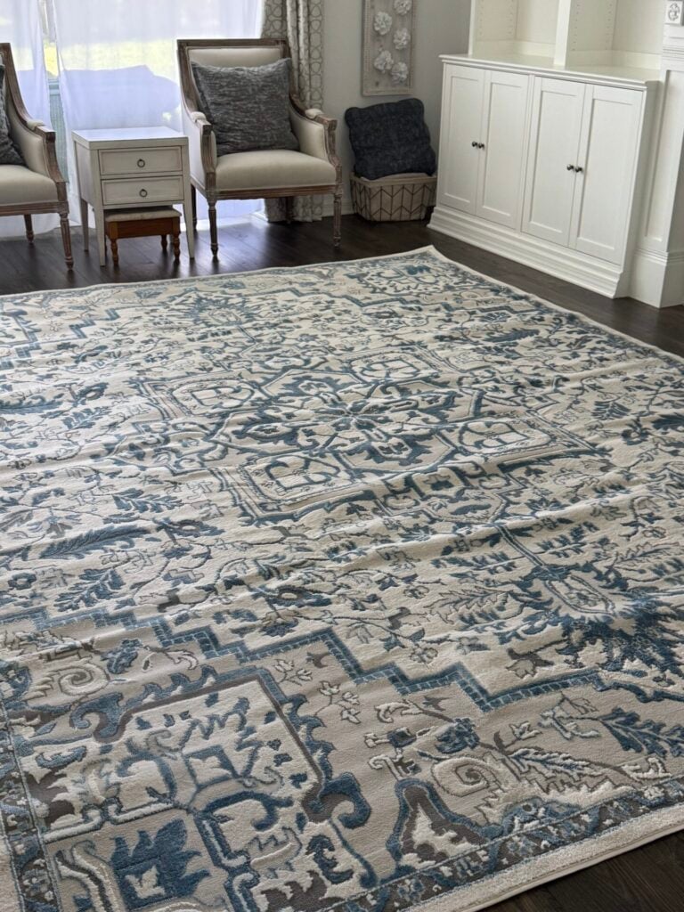 New blue and white rug that has wrinkles after opening.  