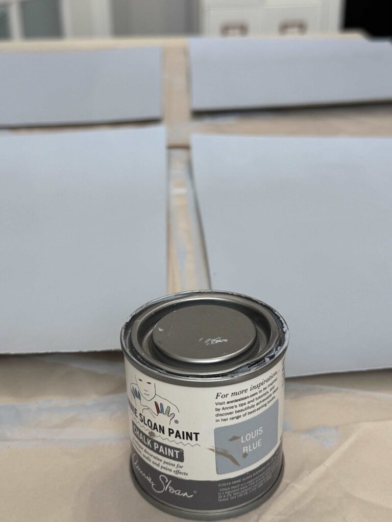 A can of Annie Sloan Louis Blue paint. 