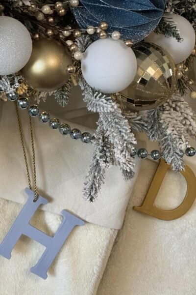 Monogram stocking tags in blue and gold.