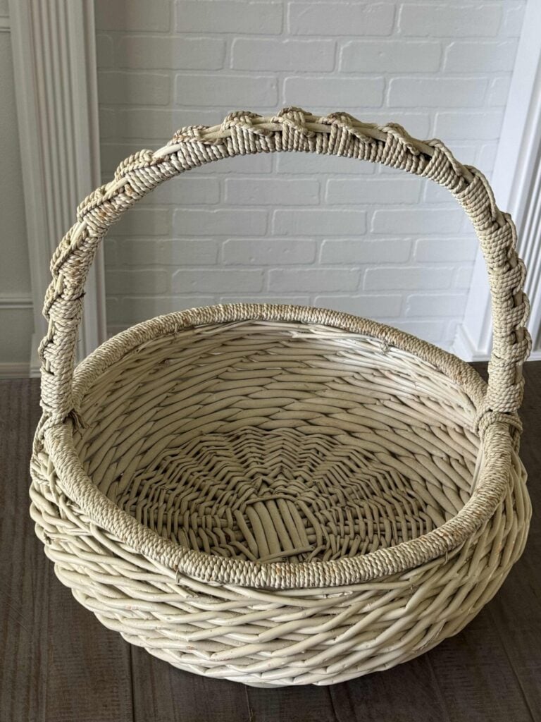 Looking inside a white vintage basket. 