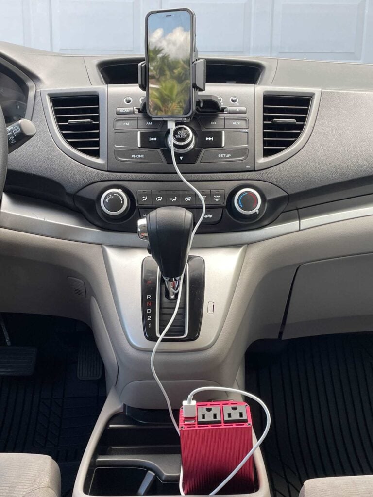 A clean and organized car with a phone charger and hands free holder is perfect for spring travel. 