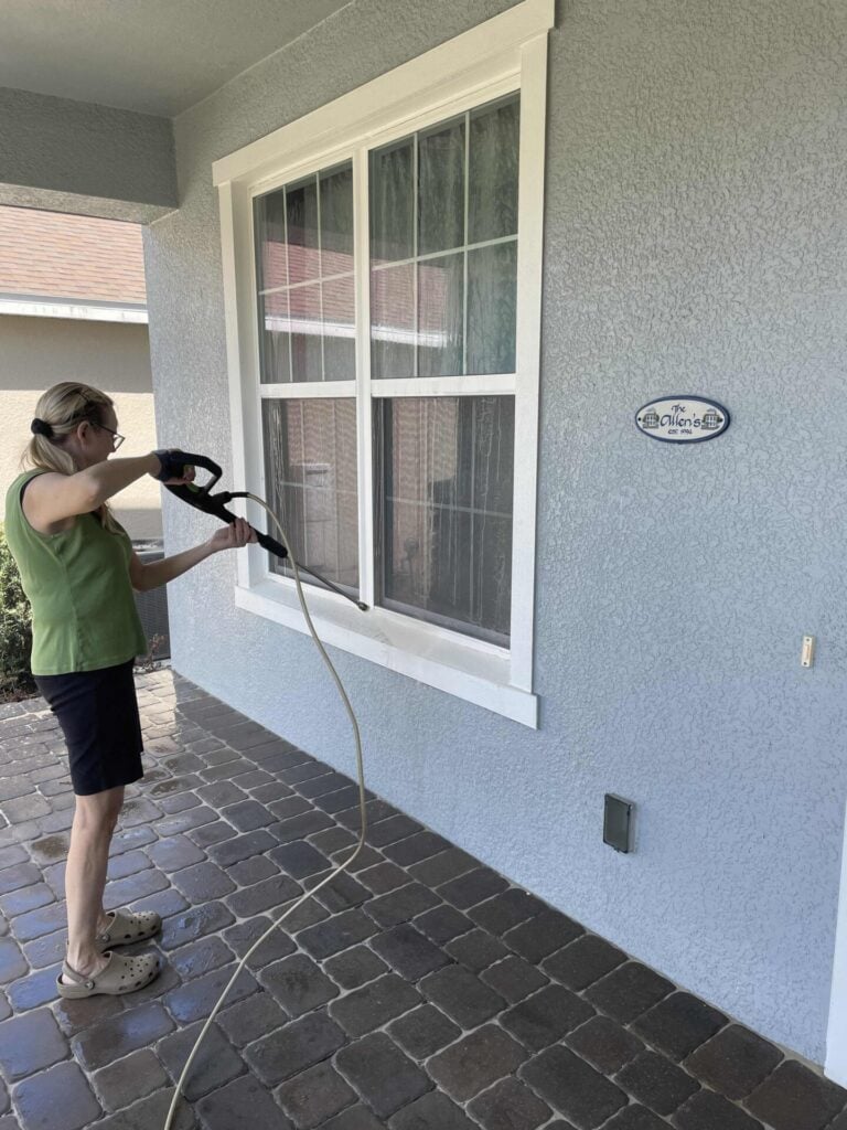 Someone power washing their front porch, a smart Spring organization project. 