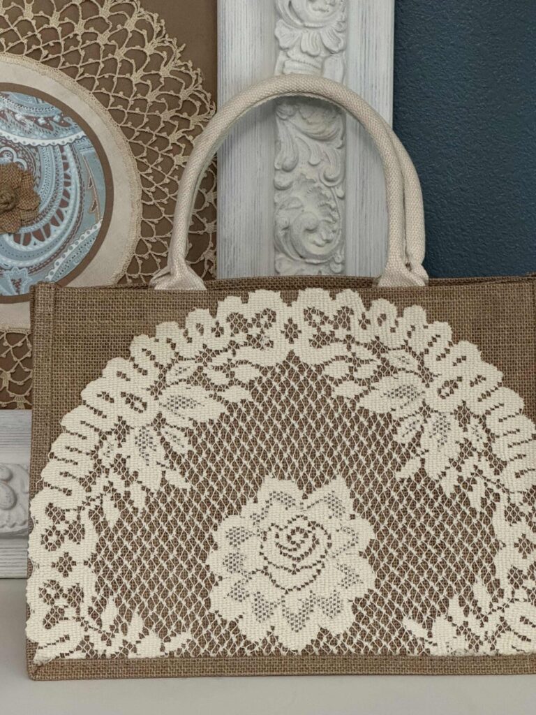A DIY burlap tote bag embellished with a doily.