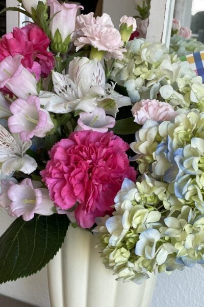Grocery store flowers arranged in a vase.
