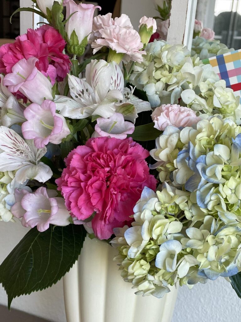 Grocery store flowers arranged in a vase.
