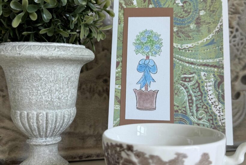 DIY handmade card with topiary stamp, patterned and solid card stock, and colored with chalk.